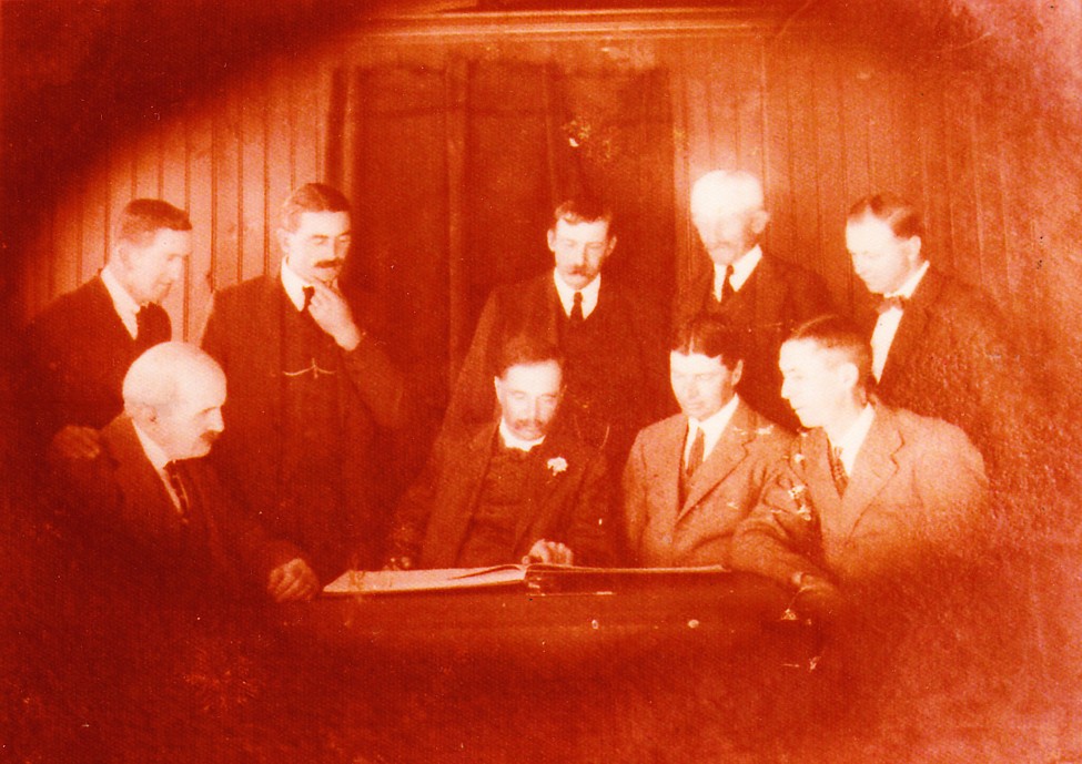 Samuel Boyd is seated, left.